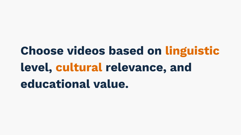 "Text image stating 'Choose videos based on linguistic level, cultural relevance, and educational value.' with key words 'linguistic' and 'cultural' highlighted in orange."