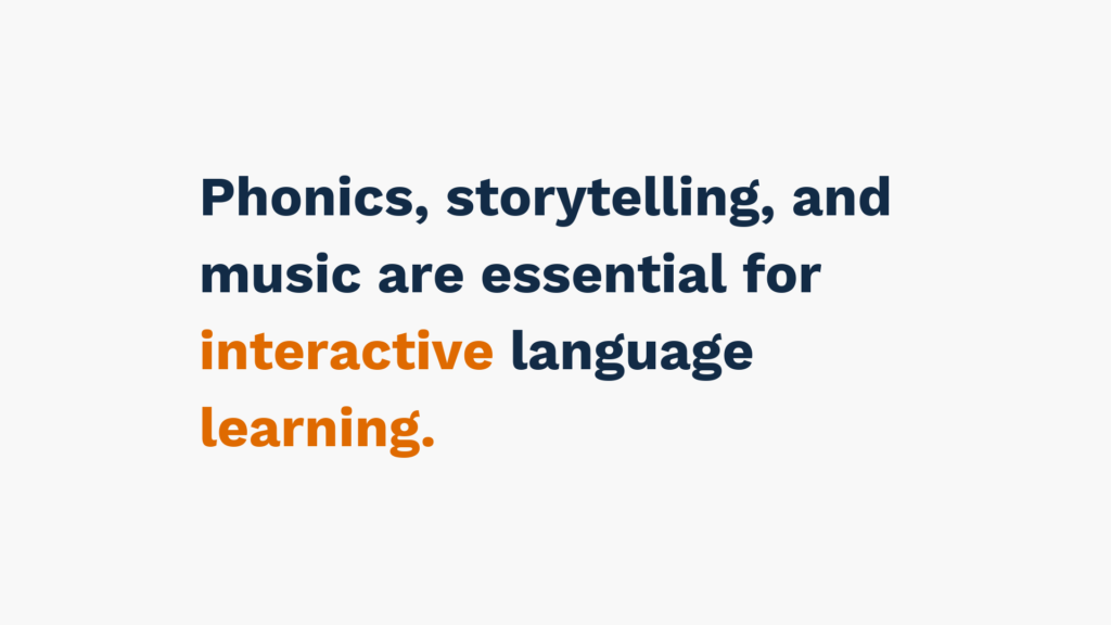 "Text stating 'Phonics, storytelling, and music are essential for interactive language learning,' with 'interactive' highlighted in orange."