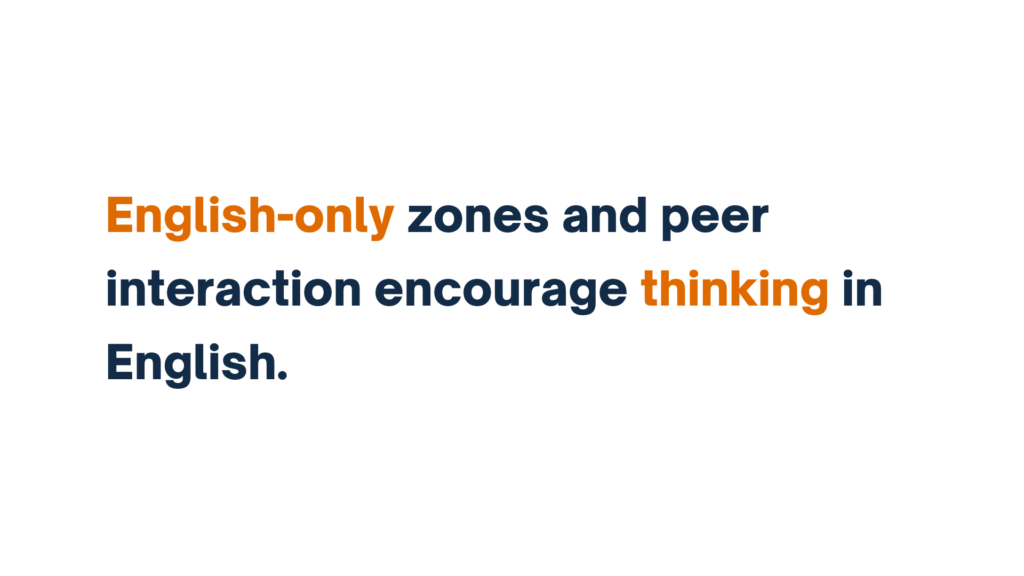 "Text emphasizing that English-only zones and peer interaction encourage thinking in English."